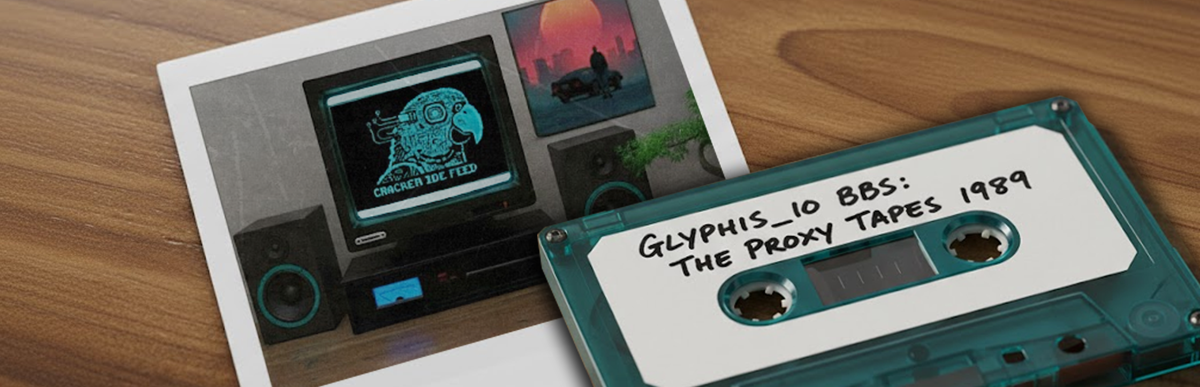 GLYPHIS_IO desk scene with cassette and monitor